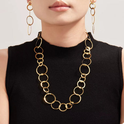 Front view of 18K Gold-Plated Chain Link Necklace in Gold showing neckline and sleeve details