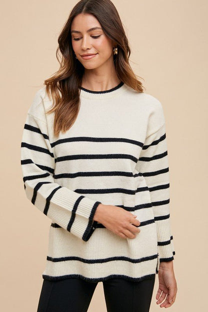 Front view of Annie Wear Side Slit Striped Round Neck Sweater in Ivory showing neckline and sleeve details