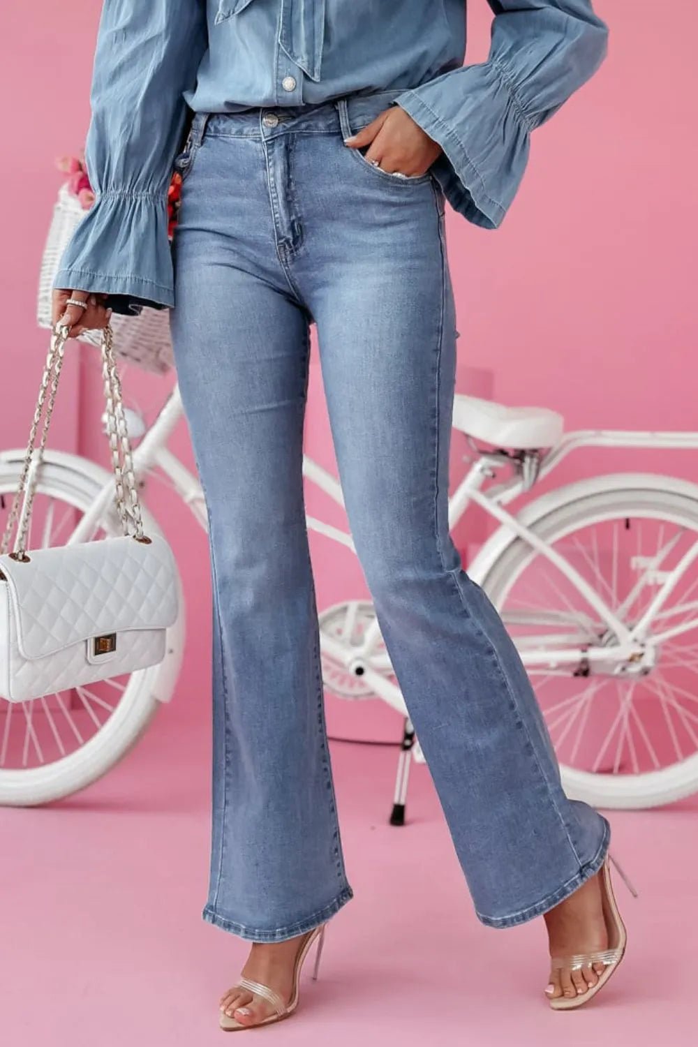 Front view of Bootcut Jeans with Pockets in Light showing neckline and sleeve details