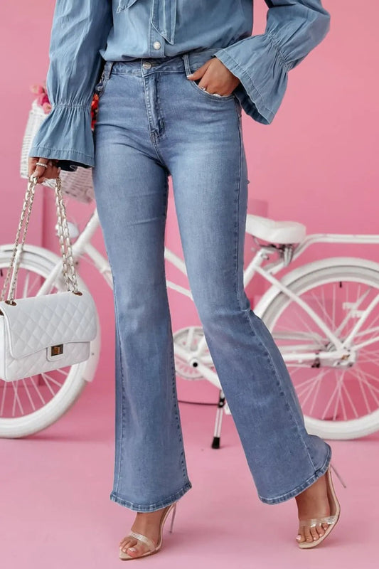 Front view of Bootcut Jeans with Pockets in Light showing neckline and sleeve details