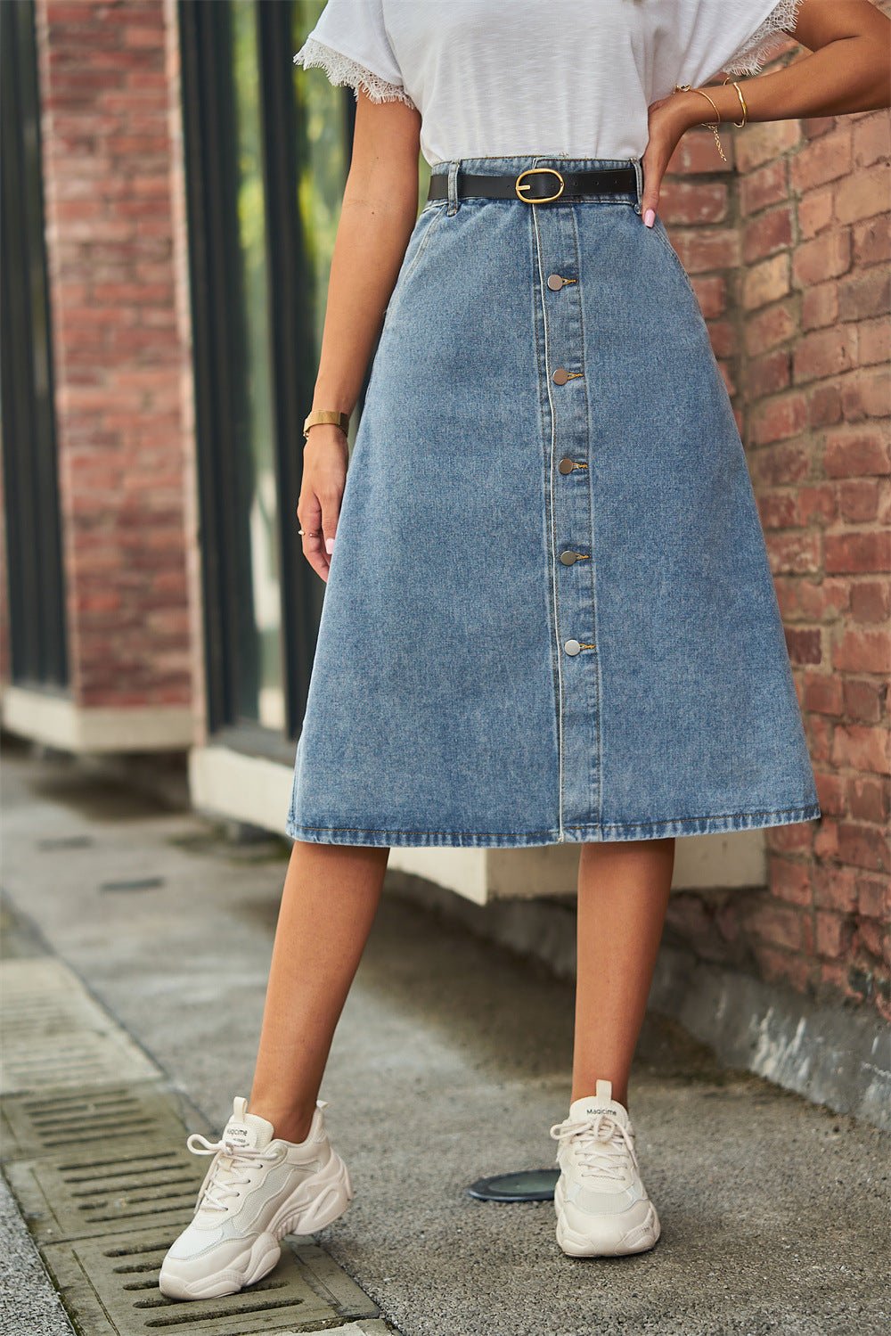 Front view of Button Front A-Line Denim Skirt in Medium showing neckline and sleeve details (95% rayon, 5% polyester Stretch)