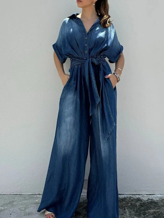 Front view of Button Front Wide Leg Denim Jumpsuit in Vintage Blue showing neckline and sleeve details