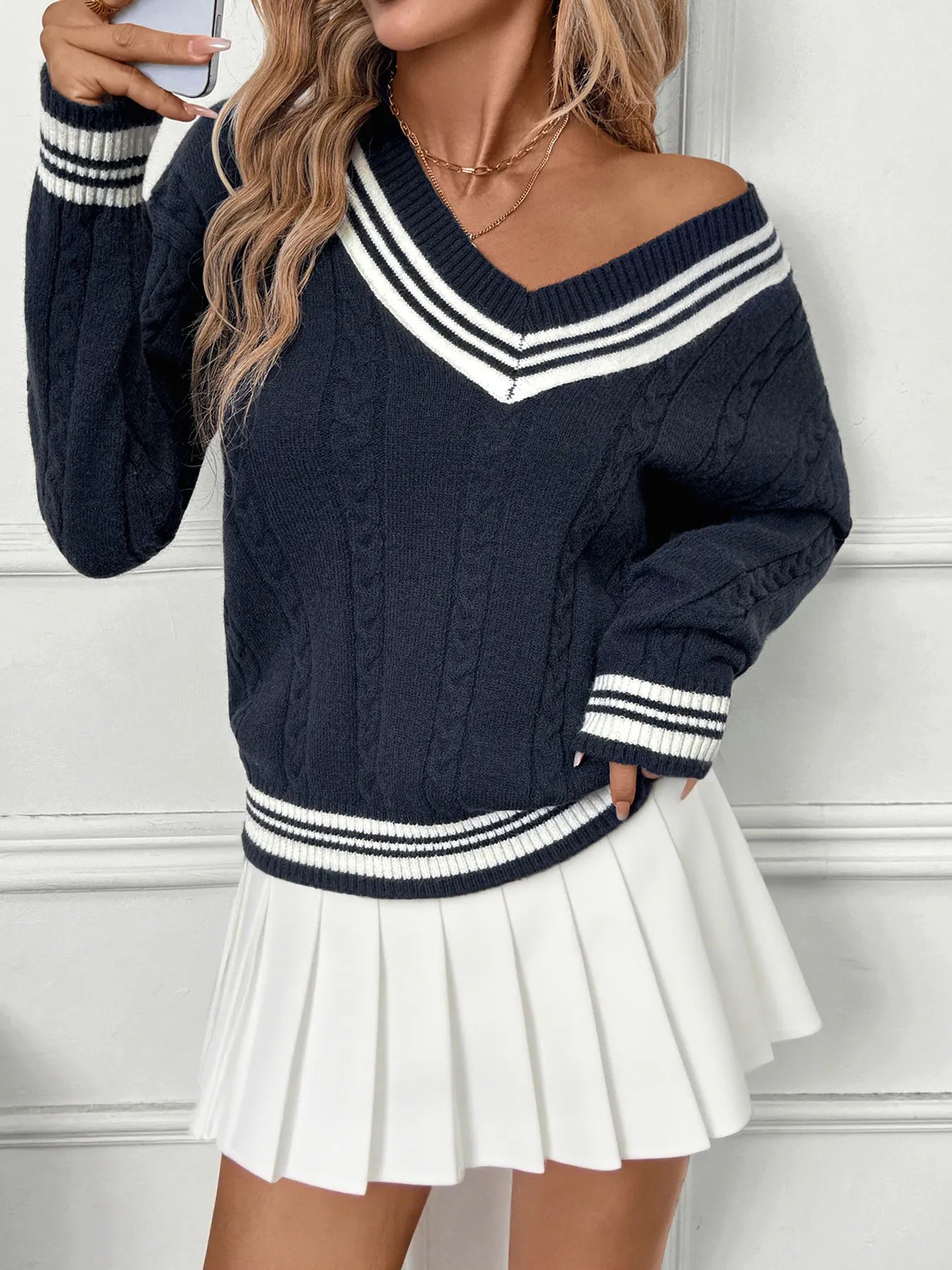 Front view of Contrast Striped V-Neck Sweater in Dark Blue showing neckline and sleeve details