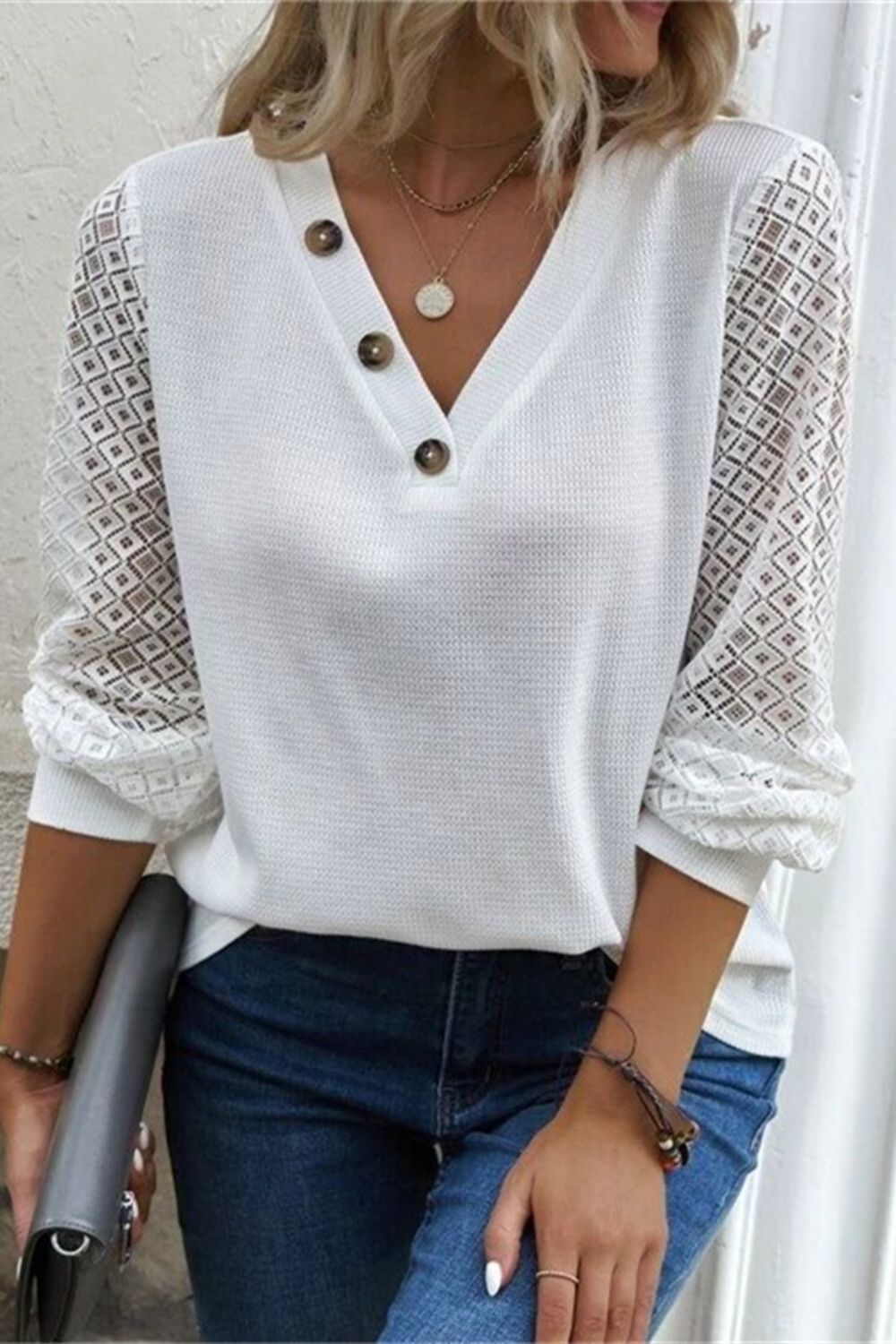 Front view of Decorative Button V-Neck Long Sleeve T-Shirt in White showing neckline and sleeve details