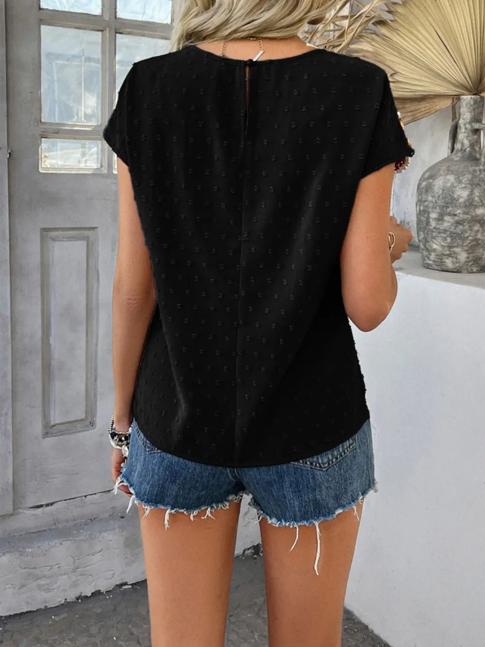 Lifestyle image of product styled for a chic daytime look