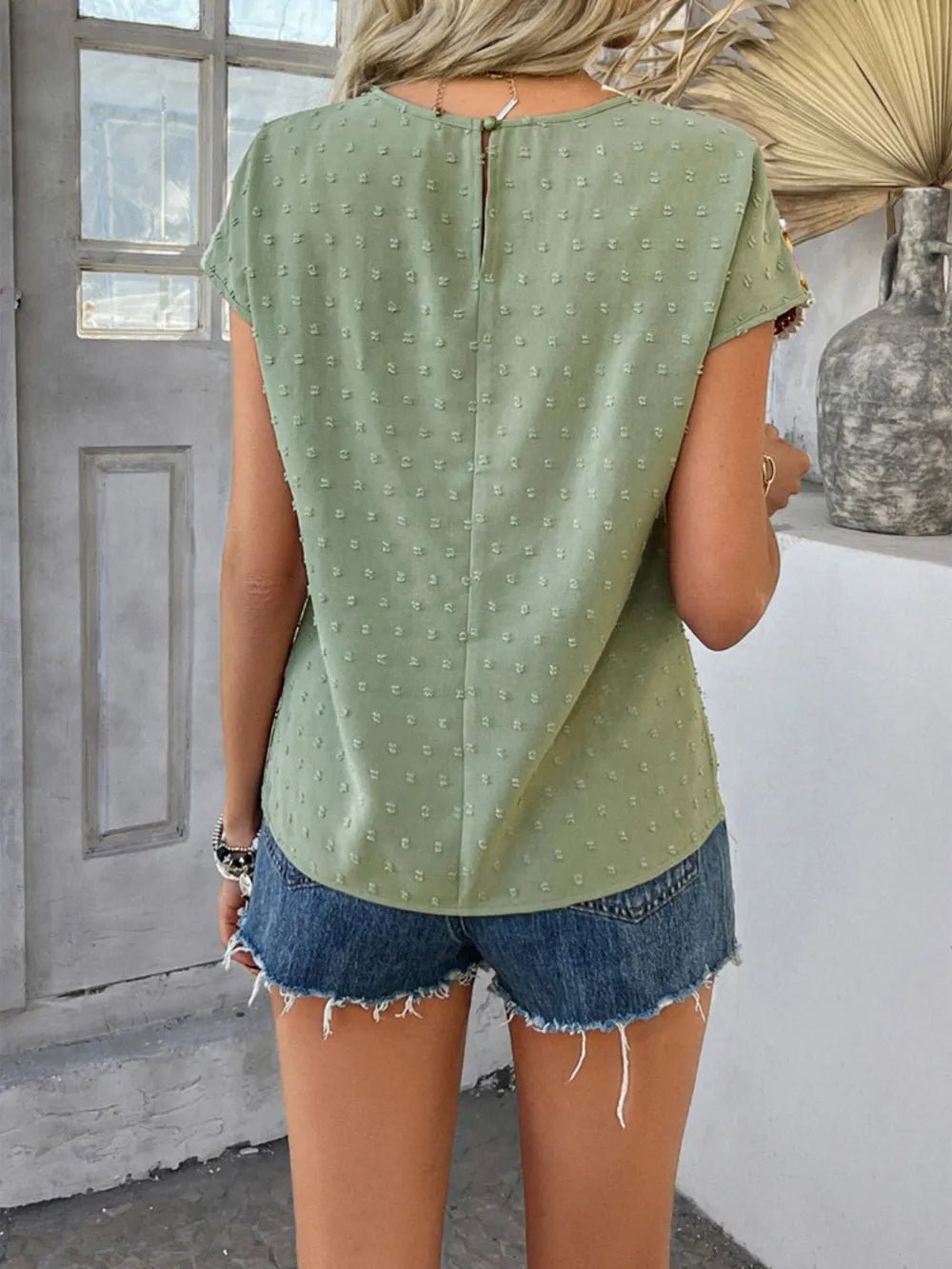 Lifestyle image of product styled for a chic daytime look