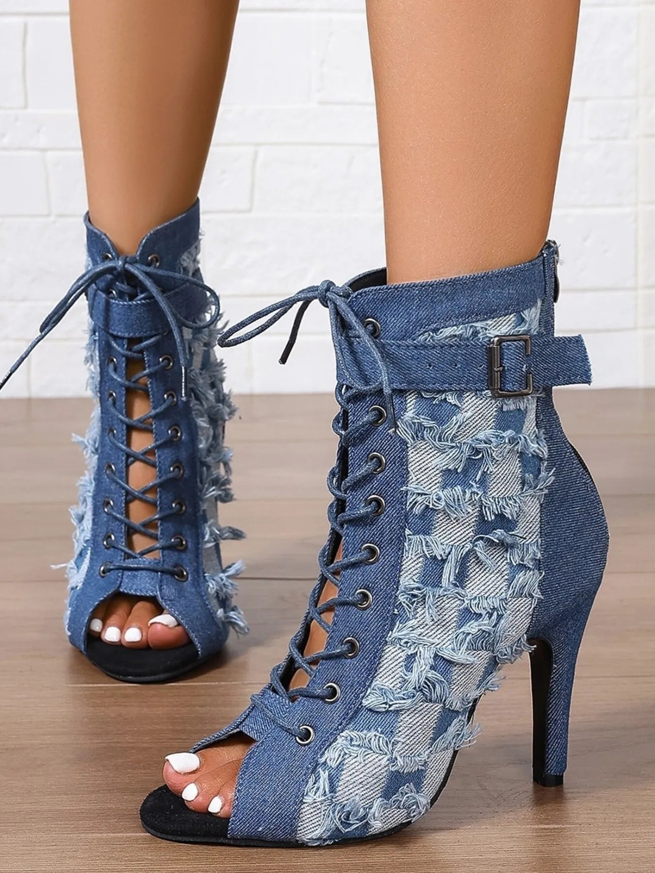 Front view of Distressed Denim Lace-Up Peep Toe Ankle Boots in Peacock Blue showing neckline and sleeve details (denim)