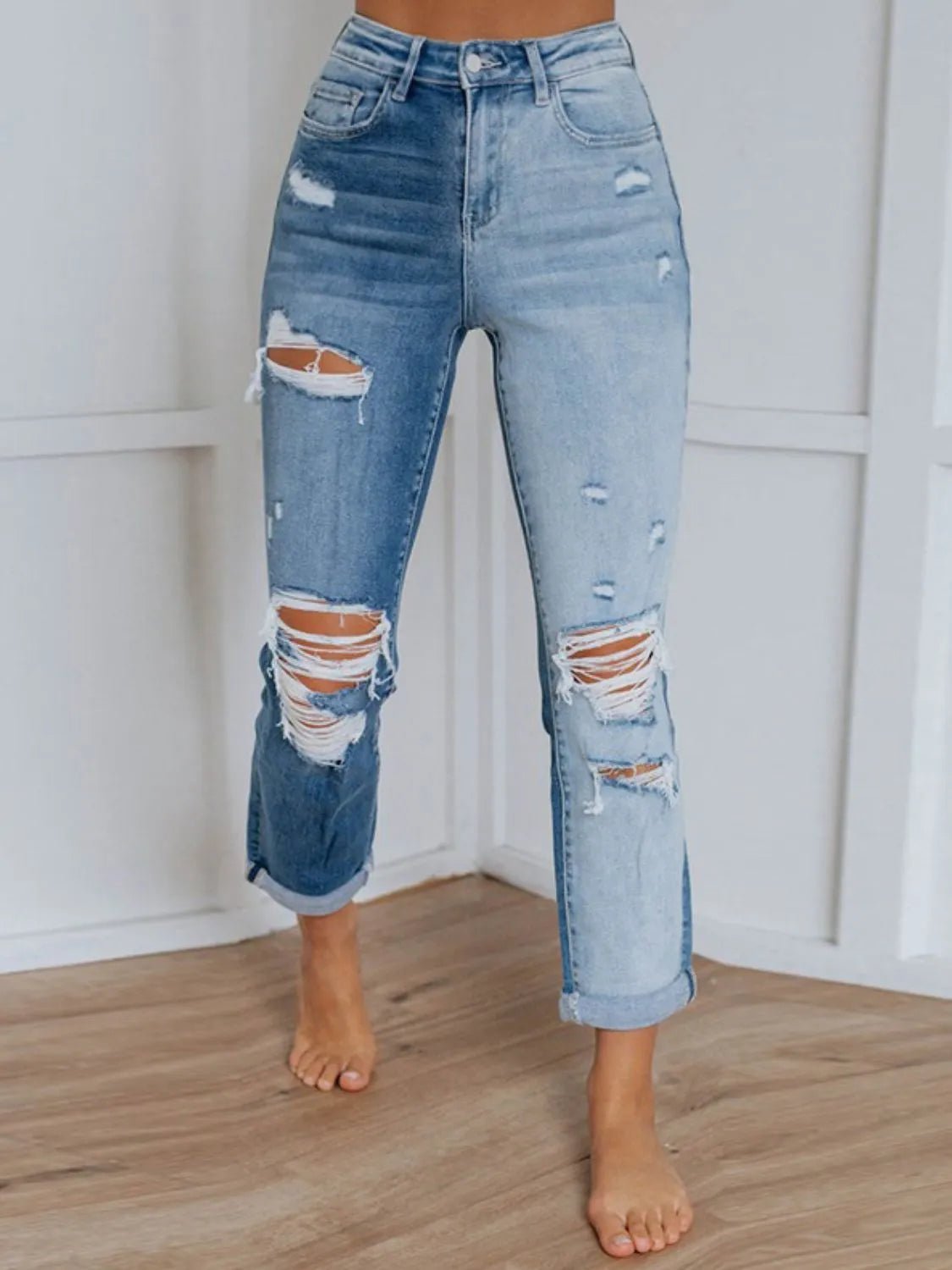 Front view of Distressed Jeans with Pockets in Light showing neckline and sleeve details