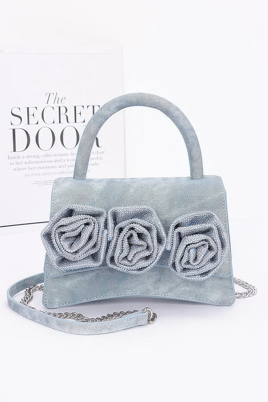 Front view of Faux Leather Rhinestone Hot Fix Flower Bag showing neckline and sleeve details (denim)