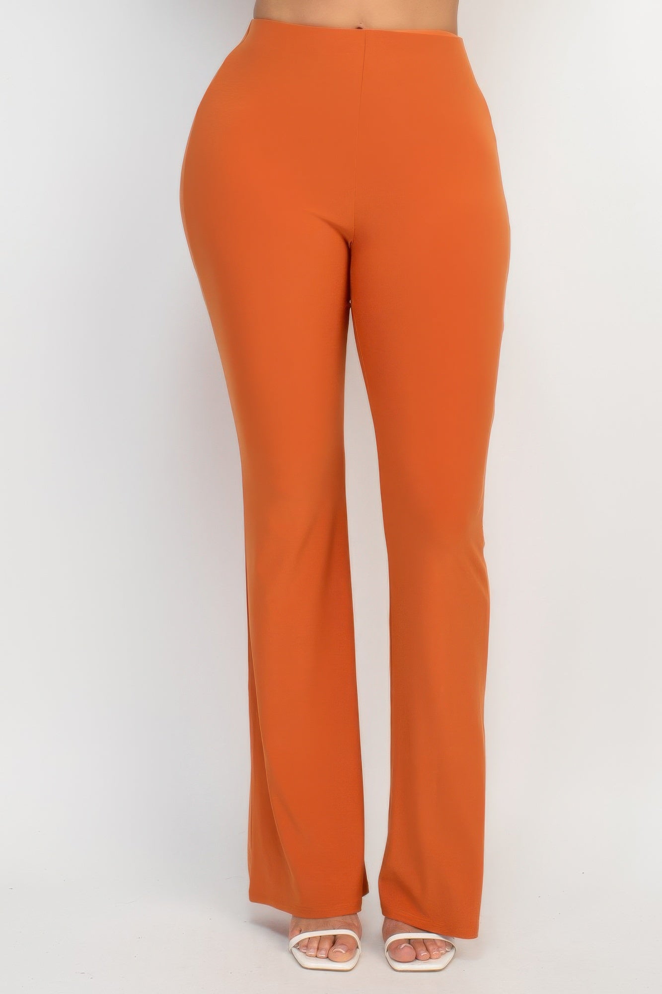 Front view of Fit And Flare Elastic Casual Pants showing neckline and sleeve details (95% Polyester, 5% Spandex High)