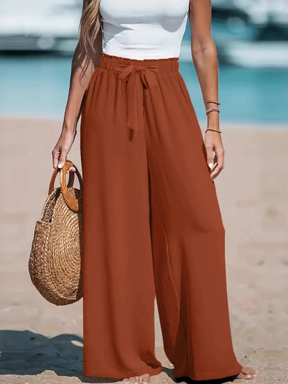 Front view of Full Size Drawstring Waist Wide Leg Pants Plus Size in Light Brown showing neckline and sleeve details