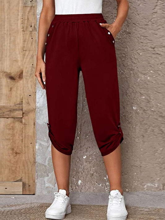 Front view of Full Size Roll-Tab Capris Pants in Burgundy showing neckline and sleeve details (100% polyester)