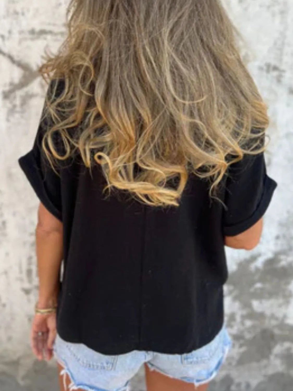 Lifestyle image of product styled for a chic daytime look