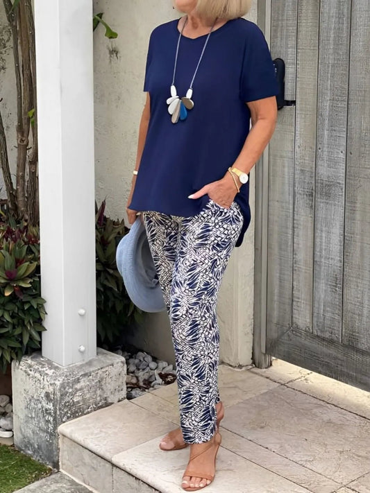 Front view of Full Size Round Neck Short Sleeve Top and Pants Set Plus Size in Dark Blue showing neckline and sleeve details