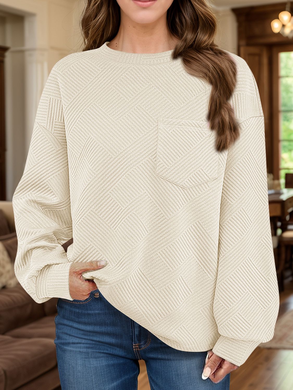Front view of Full Size Texture Round Neck Long Sleeve Sweatshirt in Tan showing neckline and sleeve details