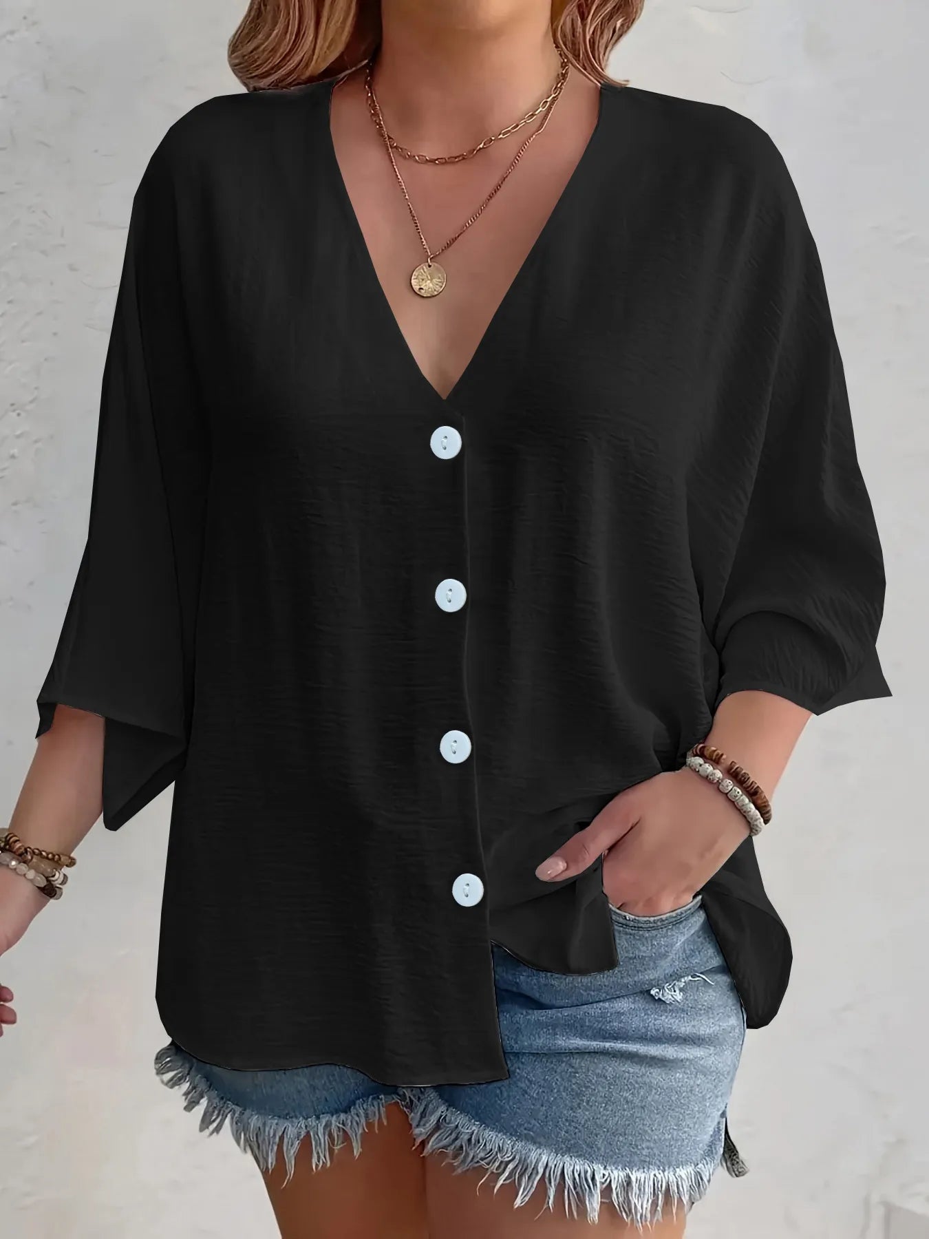 Front view of Full Size V-Neck Button Down Shirt Plus Size in Black showing neckline and sleeve details (100% high)
