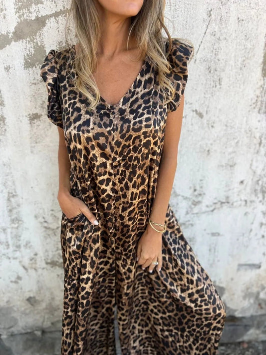 Front view of Full Size V-Neck Cap Sleeve Wide Leg Jumpsuit Plus Size in Leopard showing neckline and sleeve details