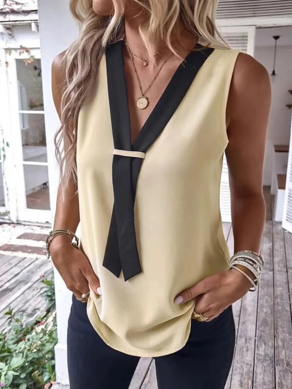 Front view of Full Size  V-Neck Contrast Tank Plus Size in Tan showing neckline and sleeve details (100% polyester)