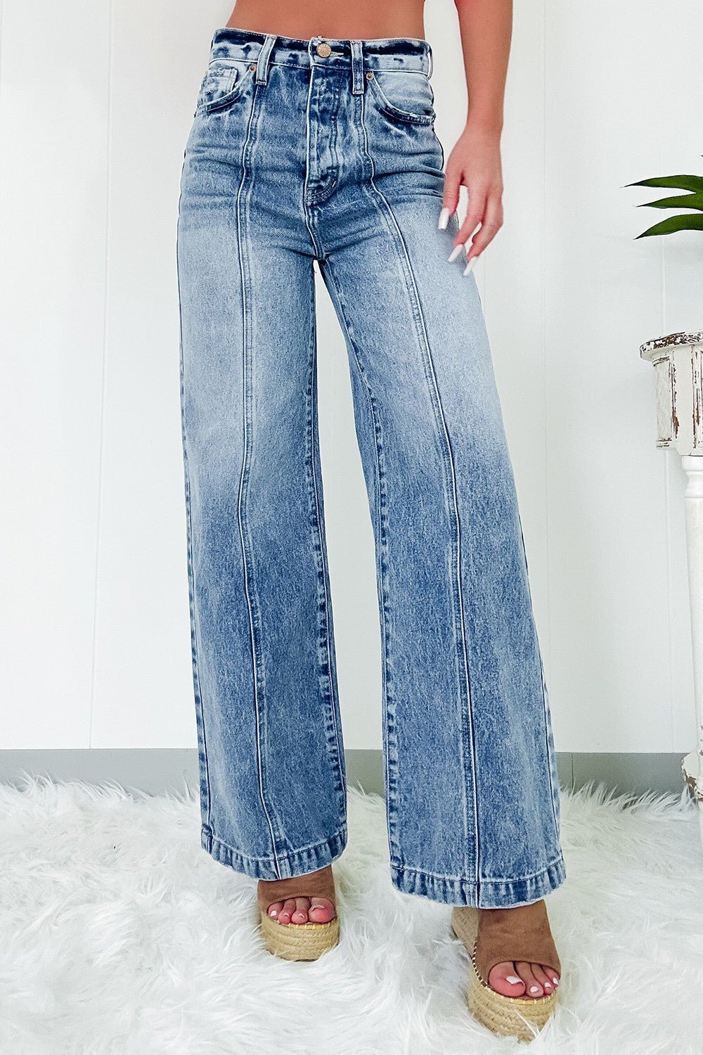 Front view of High Waist Wide Leg Jeans in Medium showing neckline and sleeve details (72% cotton, 26% polyester)