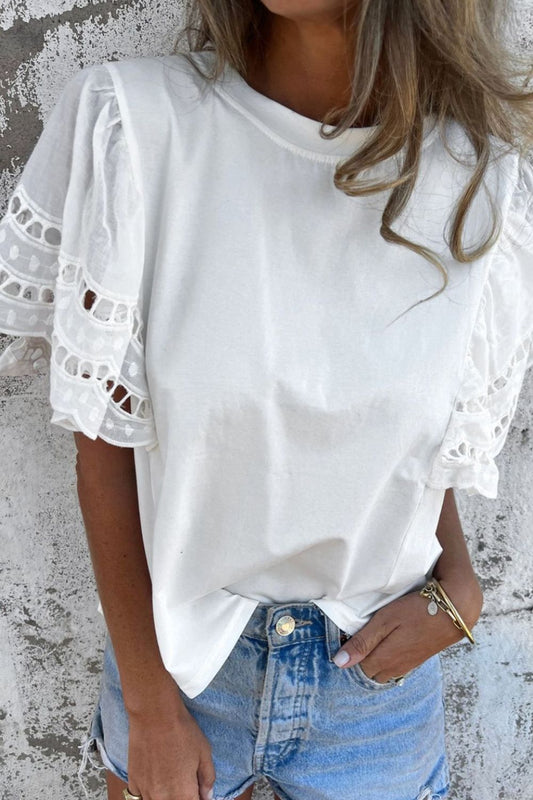 Front view of Hollow Out Embroidered Short Sleeve Round Neck Top in White showing neckline and sleeve details