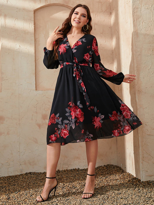 Front view of Honey Plus Size Floral Surplice Neck Tie Waist Dress in Black showing neckline and sleeve details