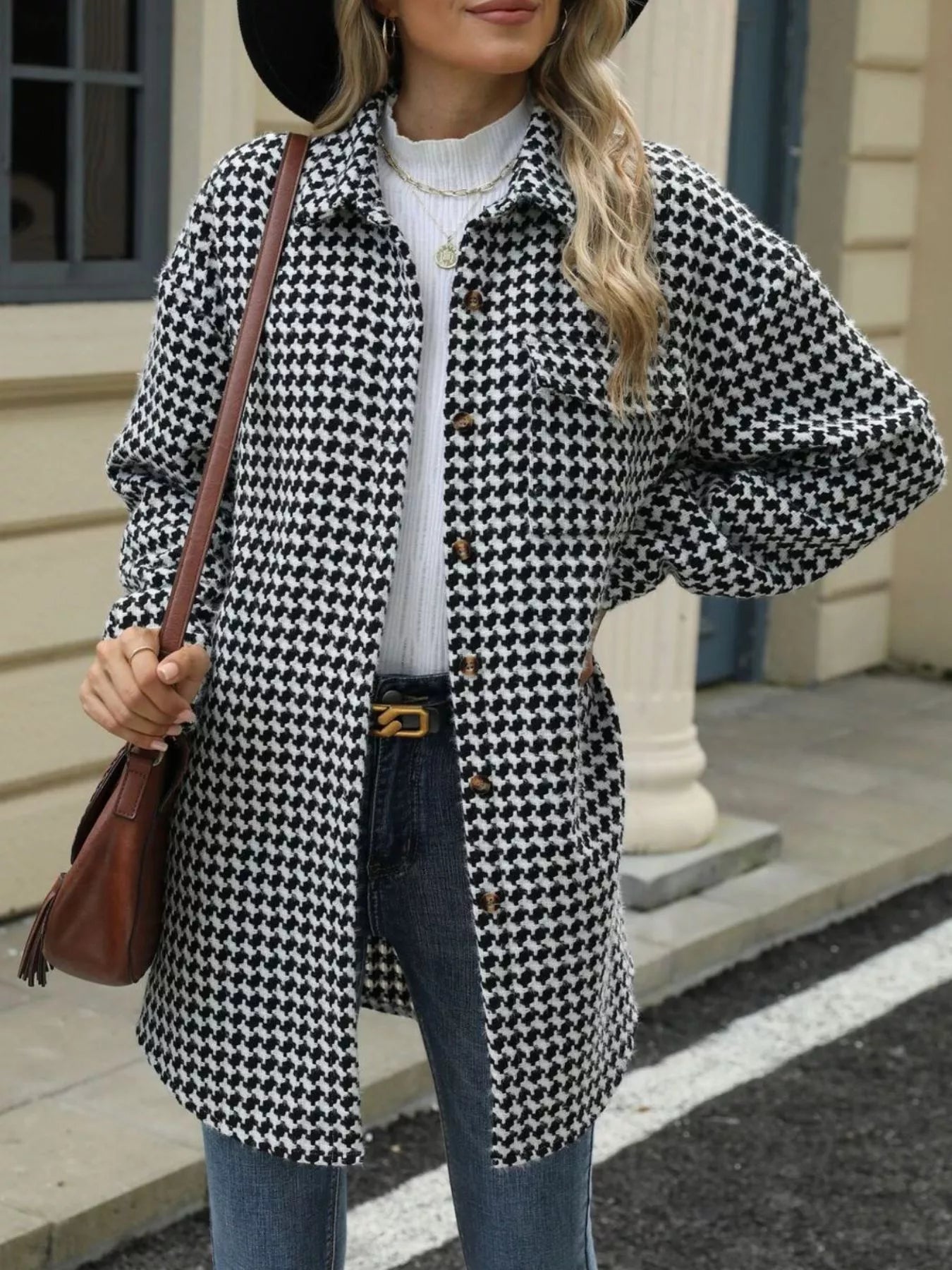 Front view of Houndstooth Button Up Long Sleeve Coat in Black showing neckline and sleeve details