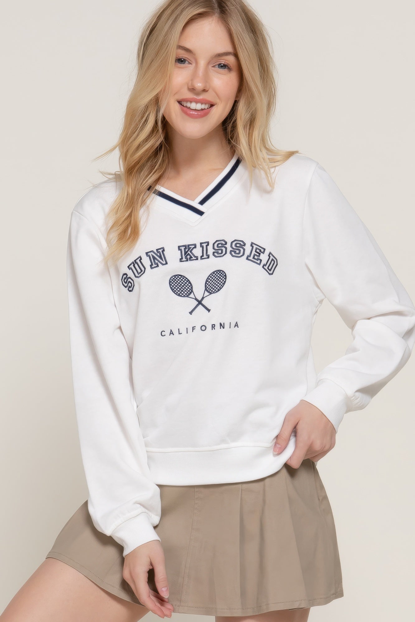 Front view of Long slv v-neck embroidered sweatshirt showing neckline and sleeve details (60% cotton)