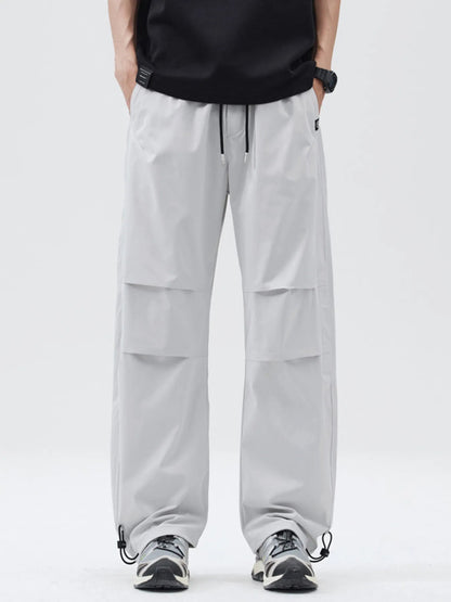 Front view of Men's Full Size Relaxed Fit Drawstring Pants Plus Size in Grey showing neckline and sleeve details