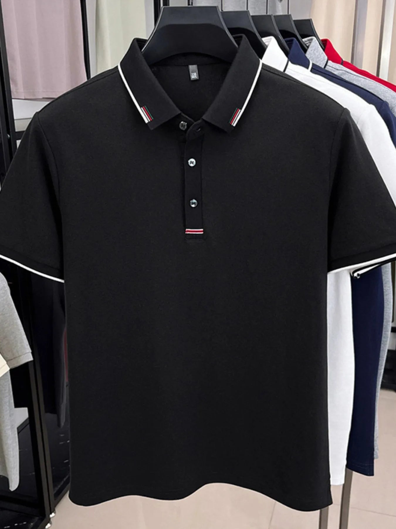 Front view of Men's Plus Size Button Detail Short Sleeve Polo in Navy showing neckline and sleeve details