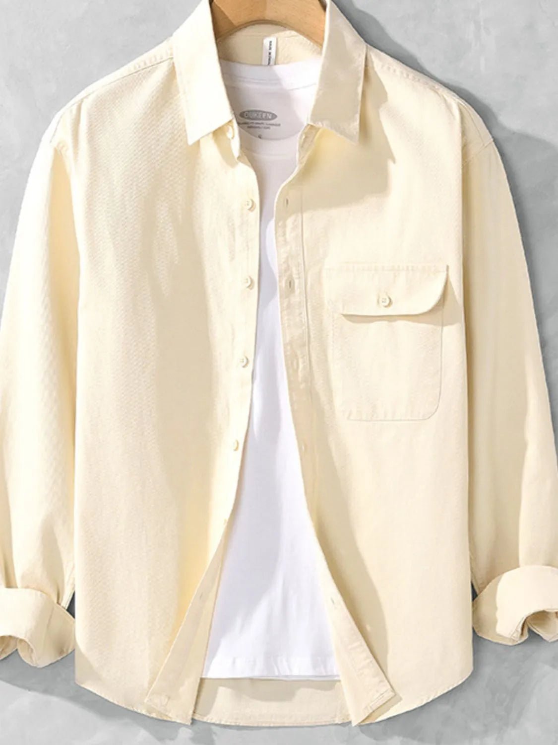 Front view of Men's Plus Size Casual Button-Down Shirt with Chest Pocket in Apricot showing neckline and sleeve details
