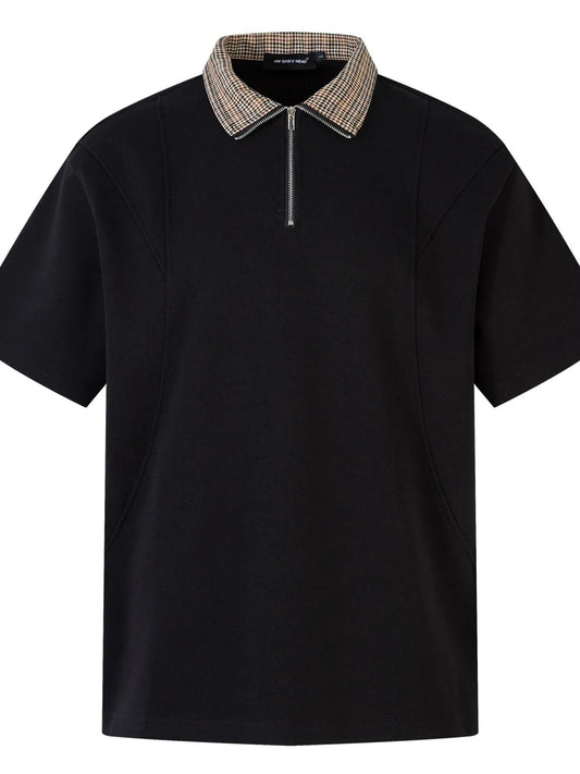 Front view of Men's Quarter Zip Short Sleeve Polo in Black showing neckline and sleeve details