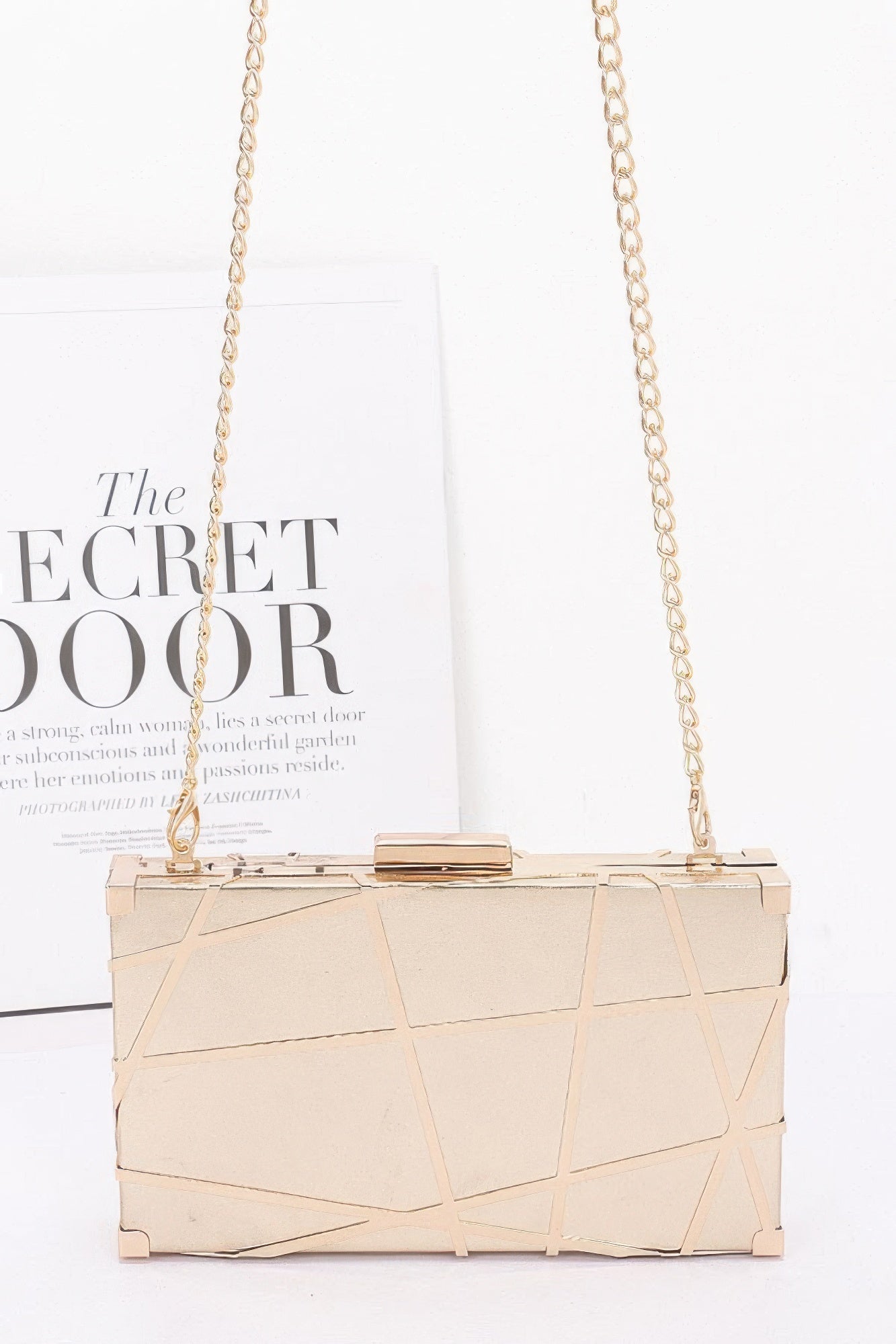 Front view of Metal Case Metallic Clutch showing neckline and sleeve details