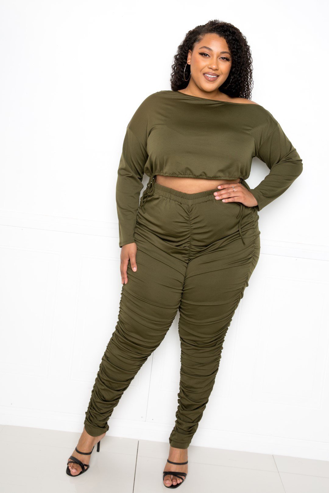 Front view of Off Shoulder Cropped Top And Ruched Leggings Sets showing neckline and sleeve details (95% polyester and)
