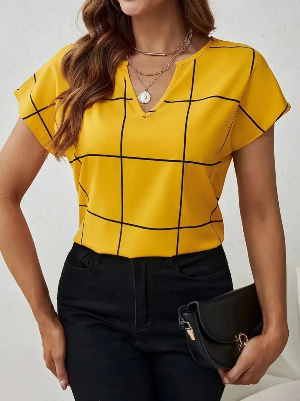 Front view of Plaid Contrast Notched Blouse in Gold showing neckline and sleeve details (95% polyester and)