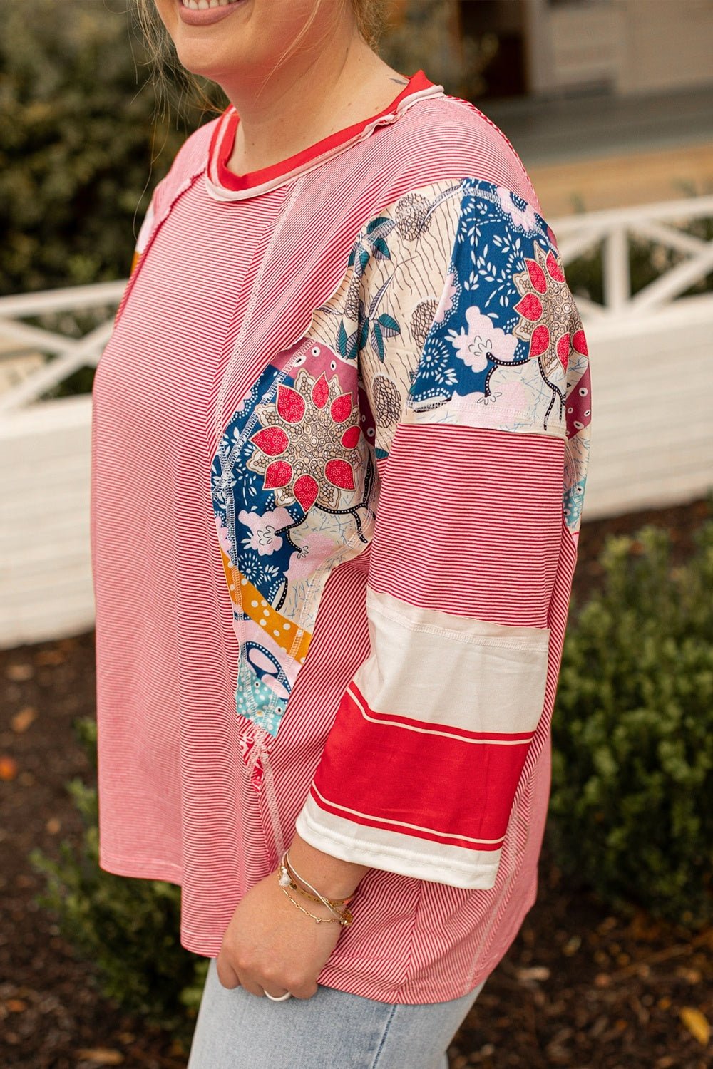 Plus Size Exposed Seam Printed Striped Round Neck Sweatshirt - Rochelle's House LLC