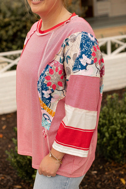 Plus Size Exposed Seam Printed Striped Round Neck Sweatshirt - Rochelle's House LLC