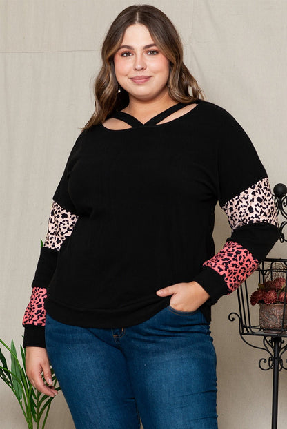 Front view of Plus Size Leopard Dropped Shoulder Long Sleeve T-Shirt in Black showing neckline and sleeve details