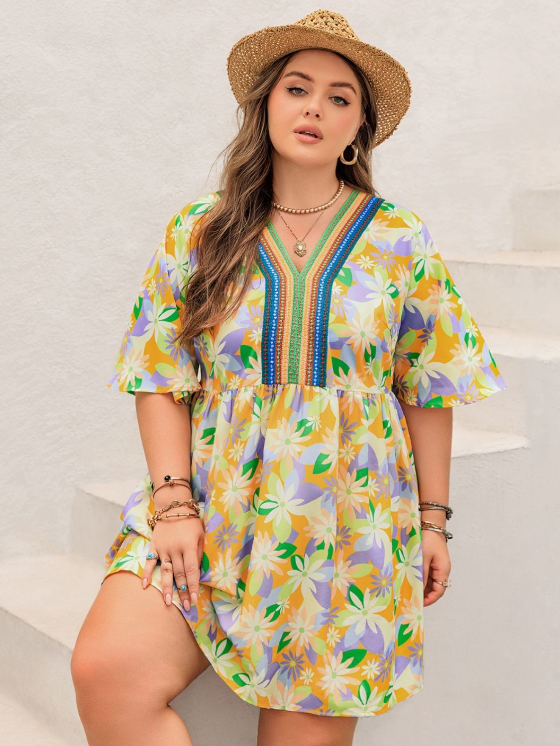Front view of Plus Size Printed V-Neck Half Sleeve Mini Dress in Yellow showing neckline and sleeve details