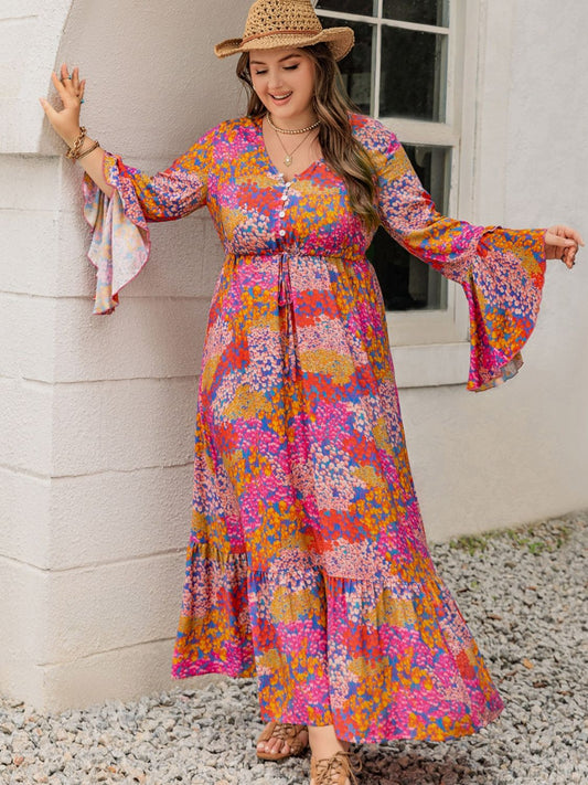Front view of Plus Size Printed V-Neck Long Sleeve Maxi Dress in Orange-Red showing neckline and sleeve details
