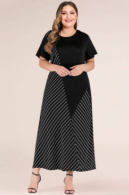 Front view of Plus Size Striped Color Block Tee Dress in Black showing neckline and sleeve details