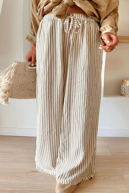 Front view of Plus Size Striped Wide Leg Pants in Stripe showing neckline and sleeve details (100% lightweight polyester)