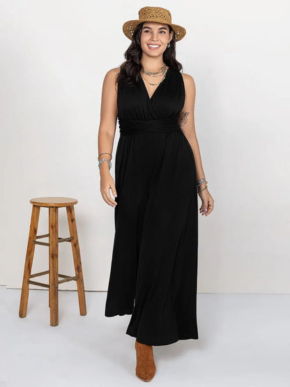 Front view of Plus Size V-Neck Wide Leg Jumpsuit in Black showing neckline and sleeve details (95% polyester and)