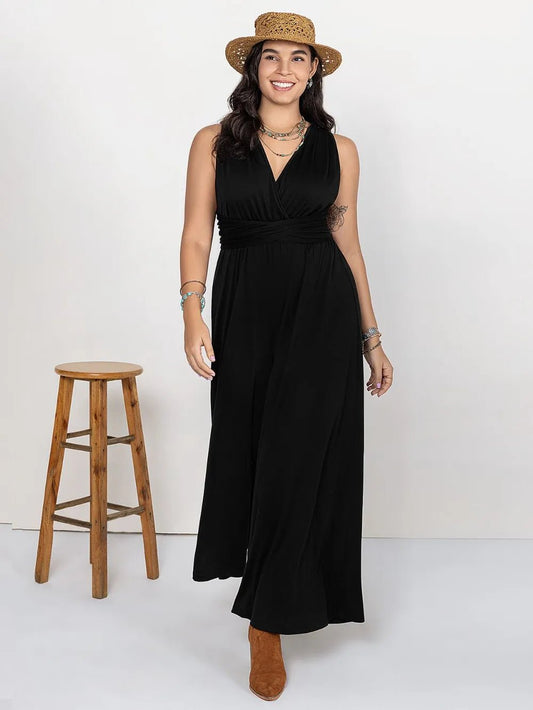 Front view of Plus Size V-Neck Wide Leg Jumpsuit in Black showing neckline and sleeve details (95% polyester and)