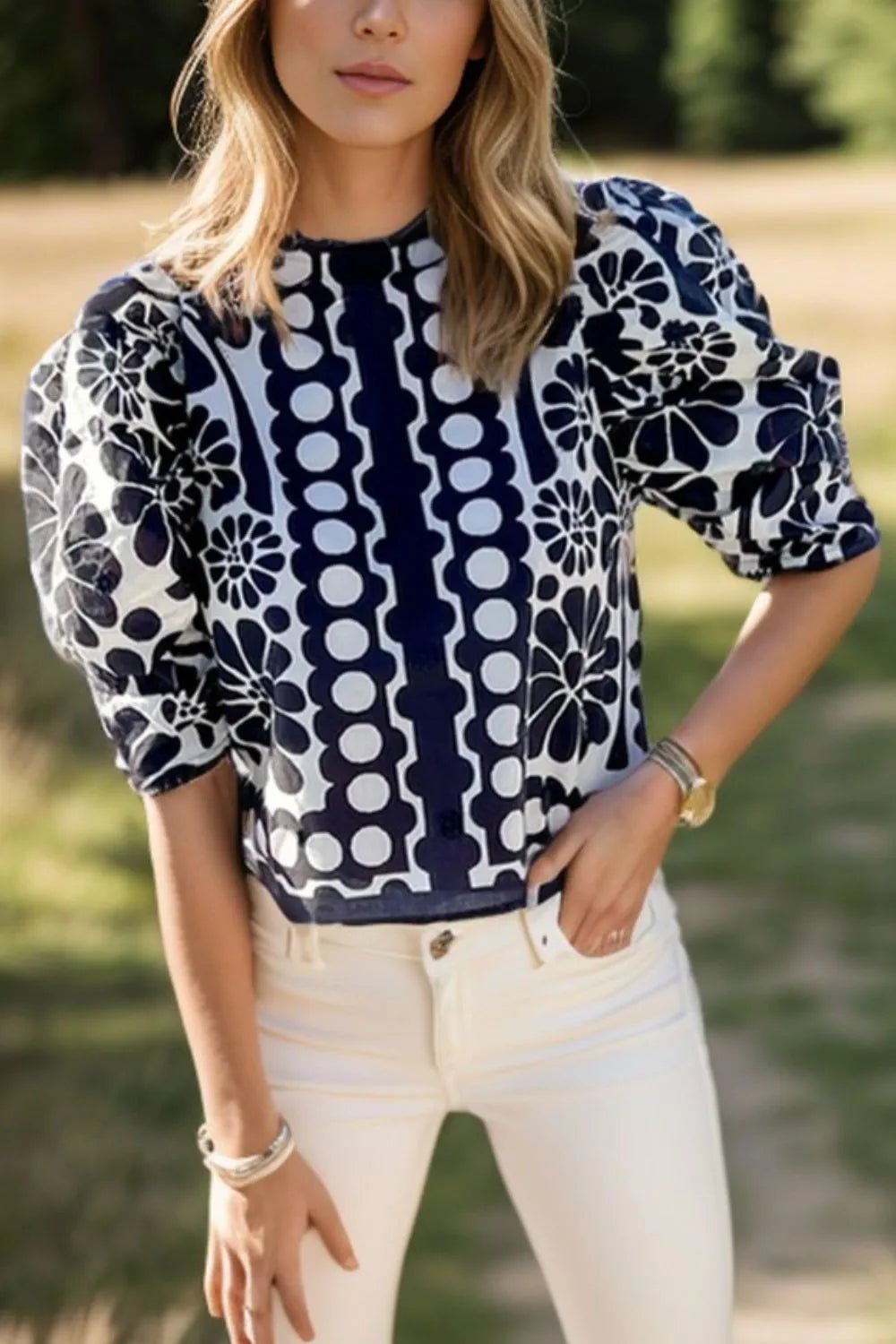 Front view of Printed Round Neck Half Sleeve Blouse in Black showing neckline and sleeve details