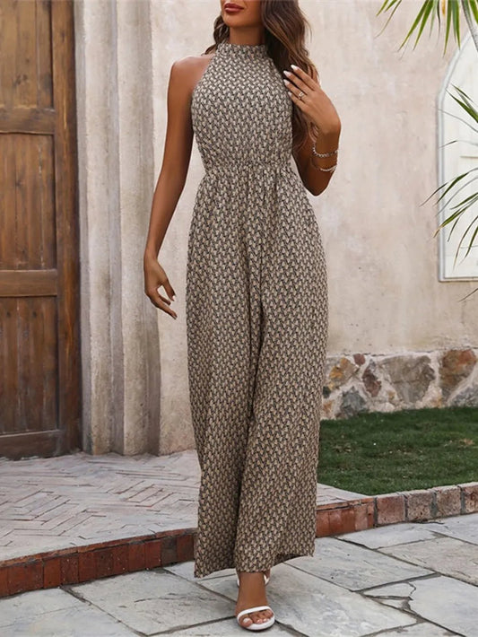 Front view of Printed Wide Leg Sleeveless Jumpsuit in Black showing neckline and sleeve details (95% polyester and)