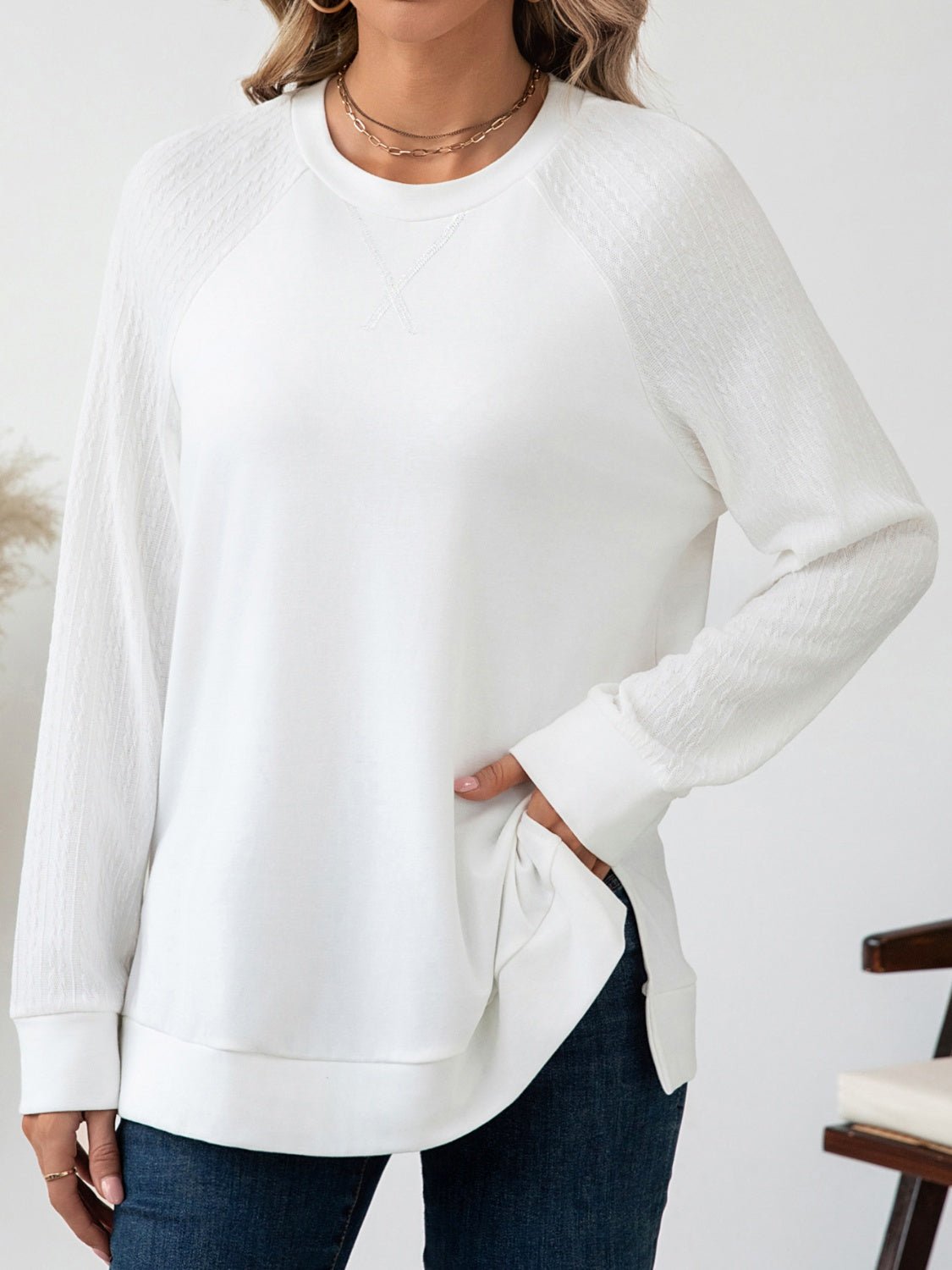 Front view of Round Neck Raglan Sleeve Top in White showing neckline and sleeve details