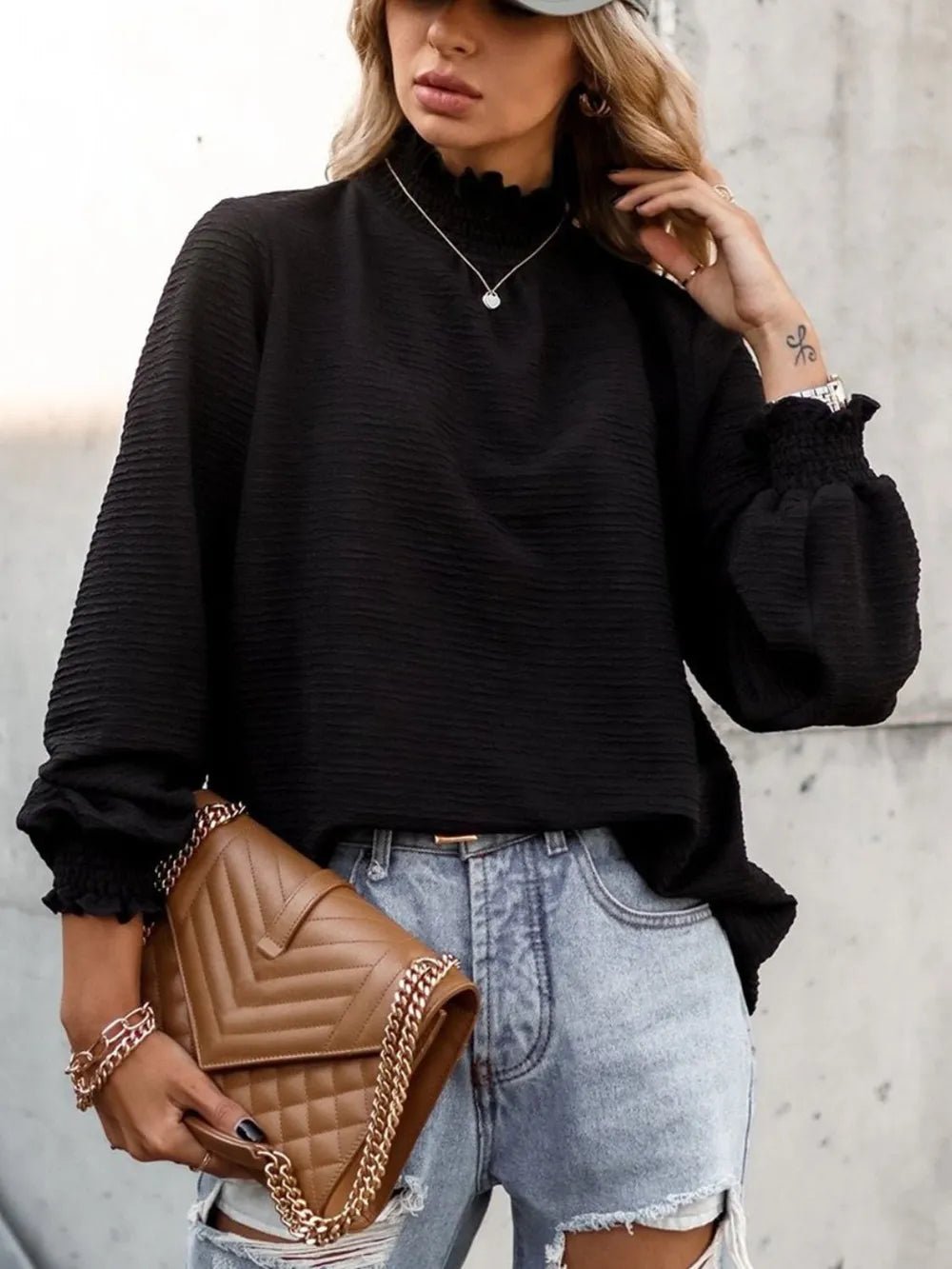 Lifestyle image of product styled for a chic daytime look