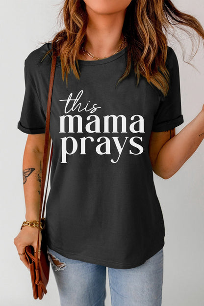 Front view of THIS MAMA PRAYS Graphic Tee in Black showing neckline and sleeve details (95% polyester, 5% spandex for a soft)