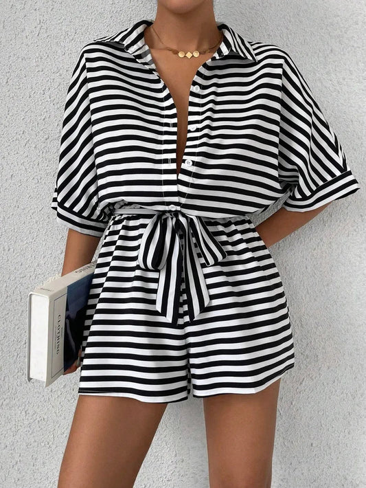Front view of Tie Waist Half Button Striped Romper in Green showing neckline and sleeve details (95% polyester and)
