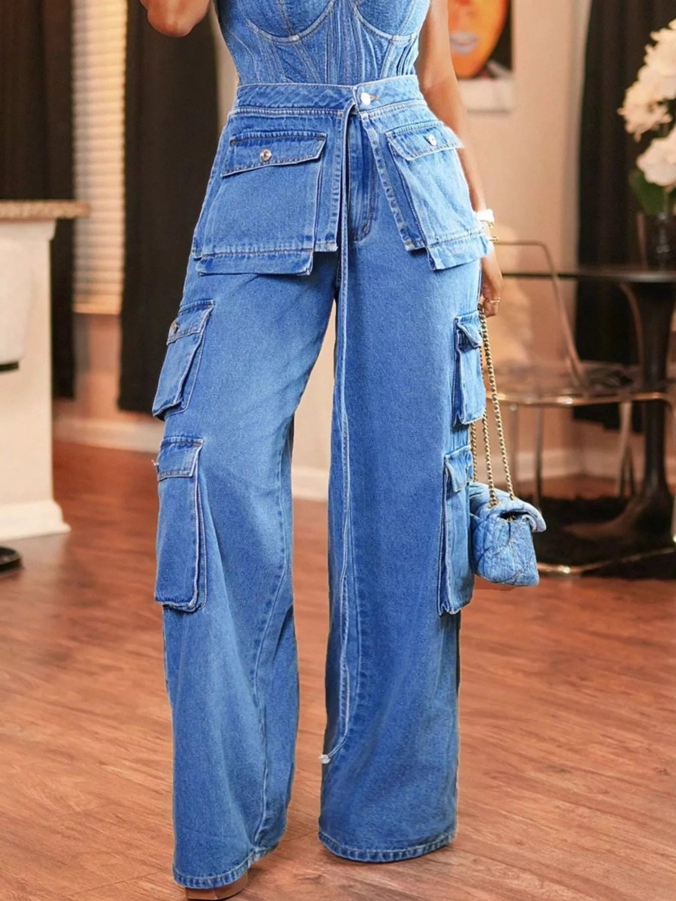 Front view of Wide Leg Cargo Jeans in Blue showing neckline and sleeve details (85% cotton, 15% polyester Care instructions)